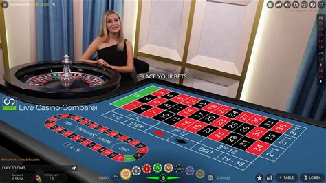 A detailed view of a live roulette table with a professional dealer, showing the spinning wheel and betting layout clearly.
